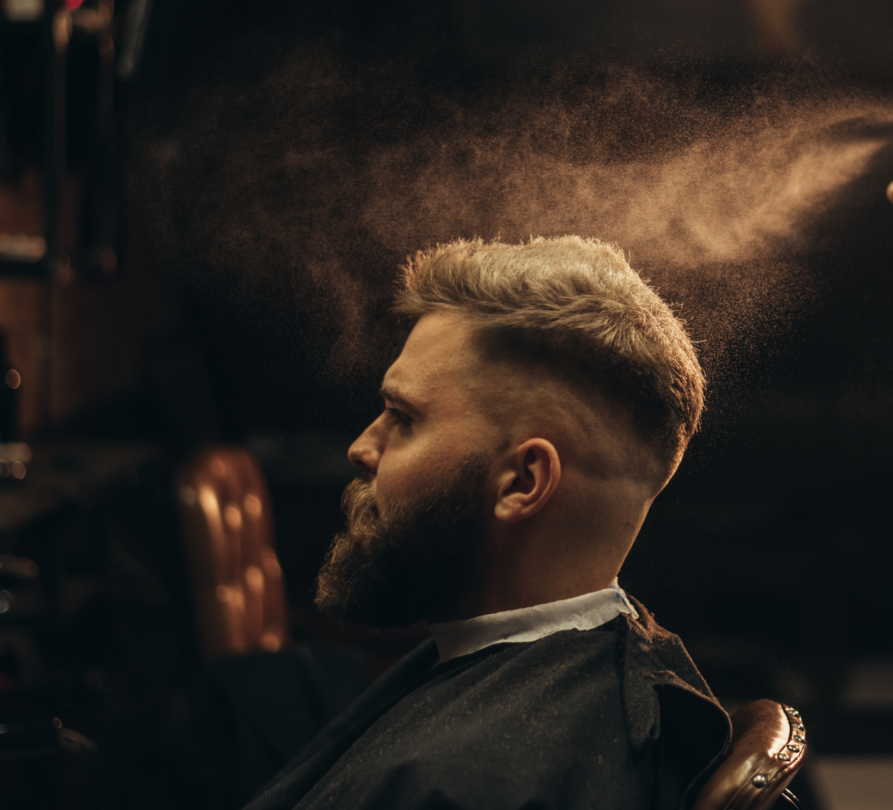 Barber cutting hair